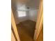 A serene bedroom with light-filled windows and a closet at 1533 S Jamaica St, Aurora, CO 80012