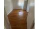 Bedroom with hardwood floors, natural light, and neutral walls at 1533 S Jamaica St, Aurora, CO 80012
