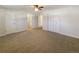 Large main bedroom with ensuite bathroom and double closets at 1772 Robb St, Lakewood, CO 80215