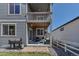 Backyard patio with grill and comfortable outdoor seating, perfect for relaxing and enjoying the outdoors at 3953 John Ave, Castle Rock, CO 80104