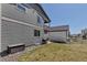 A view of the backyard with grill, patio, and deck at 3953 John Ave, Castle Rock, CO 80104