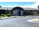 A well-designed building exterior with a grand entrance and manicured landscaping showcasing architectural elegance at 3953 John Ave, Castle Rock, CO 80104