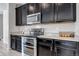 Modern kitchen with stainless steel appliances and ample countertop space at 3953 John Ave, Castle Rock, CO 80104