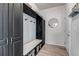 Mudroom with custom built-ins, a bench, and storage baskets offering practical organization at 3953 John Ave, Castle Rock, CO 80104