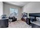 Bright office with natural light, neutral carpet and view of the outside at 3953 John Ave, Castle Rock, CO 80104