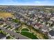 Aerial view of a well-planned community with lush green spaces and beautiful homes at 652 Pinecliff Dr, Erie, CO 80516