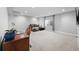 Cozy living area with neutral tones, comfortable furniture, and ample natural light at 652 Pinecliff Dr, Erie, CO 80516