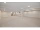 Unfinished basement featuring neutral carpet, recessed lighting, with a partial wall and support beams at 4656 Tanglewood Trl, Boulder, CO 80301