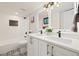 Well-lit bathroom with dual sink vanity, modern fixtures, and stylish tile flooring at 4656 Tanglewood Trl, Boulder, CO 80301