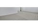 Spacious basement area with neutral carpet, base trim, and access to stairs and other rooms at 3336 N Haleyville Ct, Aurora, CO 80019