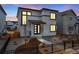 Charming two-story home showcasing modern design elements and well-maintained landscaping at 3336 N Haleyville Ct, Aurora, CO 80019