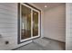 Covered patio view with a sliding glass door leading to the backyard at 3336 N Haleyville Ct, Aurora, CO 80019