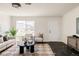 Cozy living room with plenty of light, features modern decor and flows into other living spaces at 4555 Andes St, Denver, CO 80249