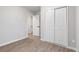 Second bedroom with double doors and closet at 5030 N Bryant, Denver, CO 80221