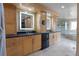 Modern bathroom with dual sinks, granite countertop, and updated fixtures at 1193 Phipps Ct, Highlands Ranch, CO 80126