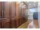 Spacious laundry room featuring custom built-in cabinets for ample storage at 1193 Phipps Ct, Highlands Ranch, CO 80126