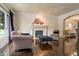 Cozy living room featuring a fireplace, plush seating, and plenty of natural light at 1193 Phipps Ct, Highlands Ranch, CO 80126