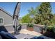 A rooftop patio offers a seating area and views of the mountains in the distance at 1193 Phipps Ct, Highlands Ranch, CO 80126
