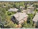 Stunning aerial view of a well-maintained home surrounded by lush greenery and mature trees at 11 Canon Pl, Greenwood Village, CO 80111
