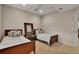 Bedroom featuring two twin beds with matching wooden frames at 11 Canon Pl, Greenwood Village, CO 80111