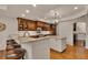 Spacious kitchen with granite counters, center island and stainless steel appliances at 11 Canon Pl, Greenwood Village, CO 80111