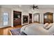 Cozy main bedroom with fireplace, hardwood floors, and private ensuite bathroom at 11 Canon Pl, Greenwood Village, CO 80111