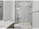 Sleek bathroom with a glass shower enclosure and contemporary fixtures, creating a spa-like experience at 6728 Mentha Dr, Castle Rock, CO 80108