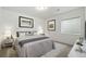 Comfortable bedroom featuring a plush bed, soft lighting, and tasteful artwork for a serene retreat at 6728 Mentha Dr, Castle Rock, CO 80108