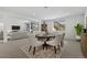 Inviting dining room features a wood table, seating for six, and a cozy rug, perfect for Gathering meals at 6728 Mentha Dr, Castle Rock, CO 80108