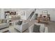 Spacious recreation room with foosball table, kitchenette, and comfortable seating arrangements at 6728 Mentha Dr, Castle Rock, CO 80108