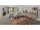 Expansive recreation room includes a foosball table, kitchenette, and comfortable seating area at 6728 Mentha Dr, Castle Rock, CO 80108