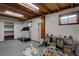 Finished basement featuring recreational space, a workout area, and built-in shelving at 1549 S Evanston St, Aurora, CO 80012