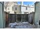 Small backyard with wooden fence and concrete patio at 1641 S Idalia Cir # F, Aurora, CO 80017