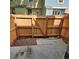 Private fenced backyard with concrete patio and fresh wood chips at 1641 S Idalia Cir # F, Aurora, CO 80017