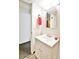 Small basement bathroom with white vanity and mirror at 1641 S Idalia Cir # F, Aurora, CO 80017