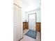 Bright entryway with a closet, wood paneling, and a stylish tiled floor at 1641 S Idalia Cir # F, Aurora, CO 80017