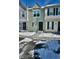 Exterior view of a townhome in a snow-covered neighborhood at 1641 S Idalia Cir # F, Aurora, CO 80017