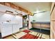 Laundry area in the basement features a washer, dryer, and utility sink at 1641 S Idalia Cir # F, Aurora, CO 80017