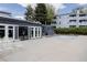 A clean community pool with lounge chairs surrounding it at 7395 E Eastman Ave # 202N, Denver, CO 80231