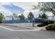 Community tennis court surrounded by a fence for friendly matches at 7395 E Eastman Ave # 202N, Denver, CO 80231