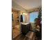 Well-lit bathroom with modern vanity and shower-tub combination at 11576 E Bayaud Dr, Aurora, CO 80012