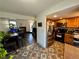 Open-concept layout seamlessly connects the kitchen and living spaces at 11576 E Bayaud Dr, Aurora, CO 80012