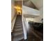 Elegant staircase leading to the upper level of the home at 11576 E Bayaud Dr, Aurora, CO 80012
