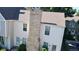 An aerial view showing the roof and facade of this cozy townhome at 8960 W Dartmouth Pl, Lakewood, CO 80227