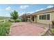 The backyard includes a wooden patio and brick patio area with privacy fence at 17710 E Emilia Dr, Parker, CO 80134