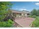 Spacious backyard with patio, a wooden pergola and mature landscaping at 17710 E Emilia Dr, Parker, CO 80134