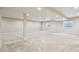 Spacious finished basement featuring neutral carpet, recessed lighting, and egress windows for natural light at 17710 E Emilia Dr, Parker, CO 80134