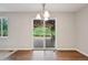 The dining room features hardwood floors and sliding glass doors to the backyard deck at 17710 E Emilia Dr, Parker, CO 80134