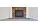 Close-up of a cozy fireplace with a stone surround, offering warmth and charm to the living space at 17710 E Emilia Dr, Parker, CO 80134