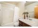 Clean bathroom featuring a shower/tub combo and a vanity with sink at 1933 Chestnut St, Fort Lupton, CO 80621